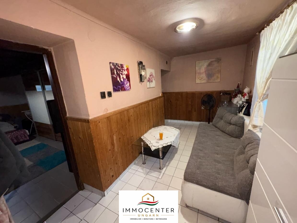 House in need of renovation in a quiet, harmonious setting