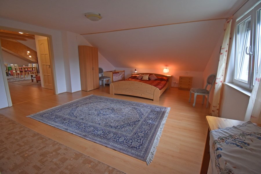 (AAAB) Two-family house with a large plot of land in a quiet location