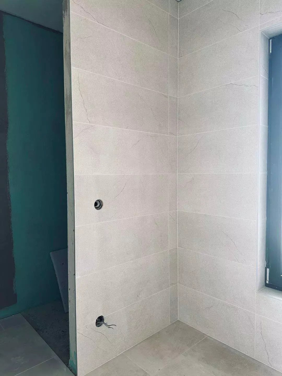 Elegant shower cabin with high-quality natural stone look - exclusive wellness oasis awaits you!