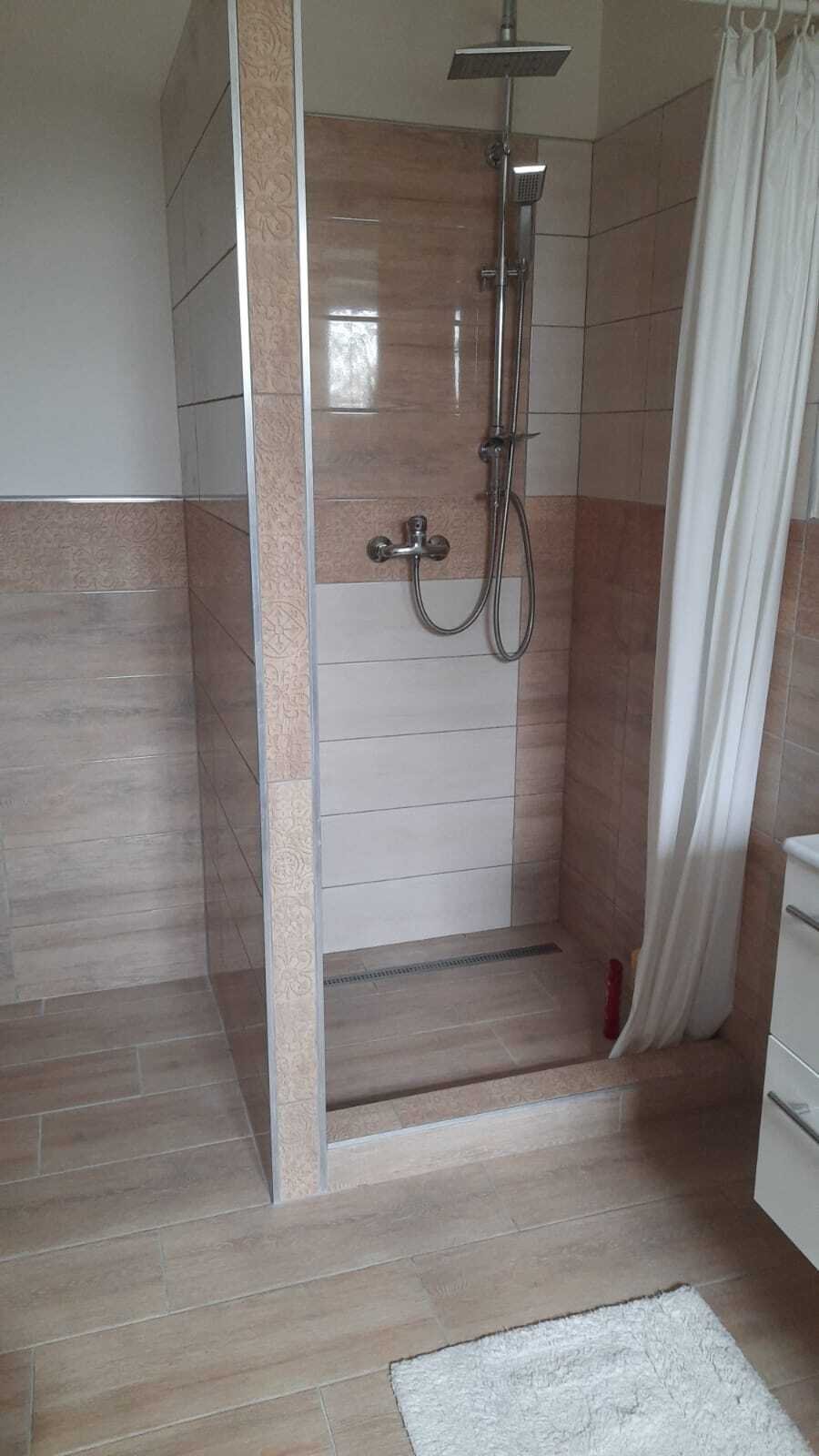 Modern shower bathroom with walk-in shower and high-quality fittings