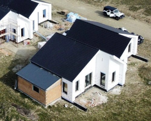 Stilvoller Neubau am Rande des berühmten Golfplatzes (AAA) (IB50702) — Modernes Architektur-Highlight: Energieeffizientes Einfamilienhaus mit intelligenter Gebäudeanbindung und harmonischer Dachgestaltung